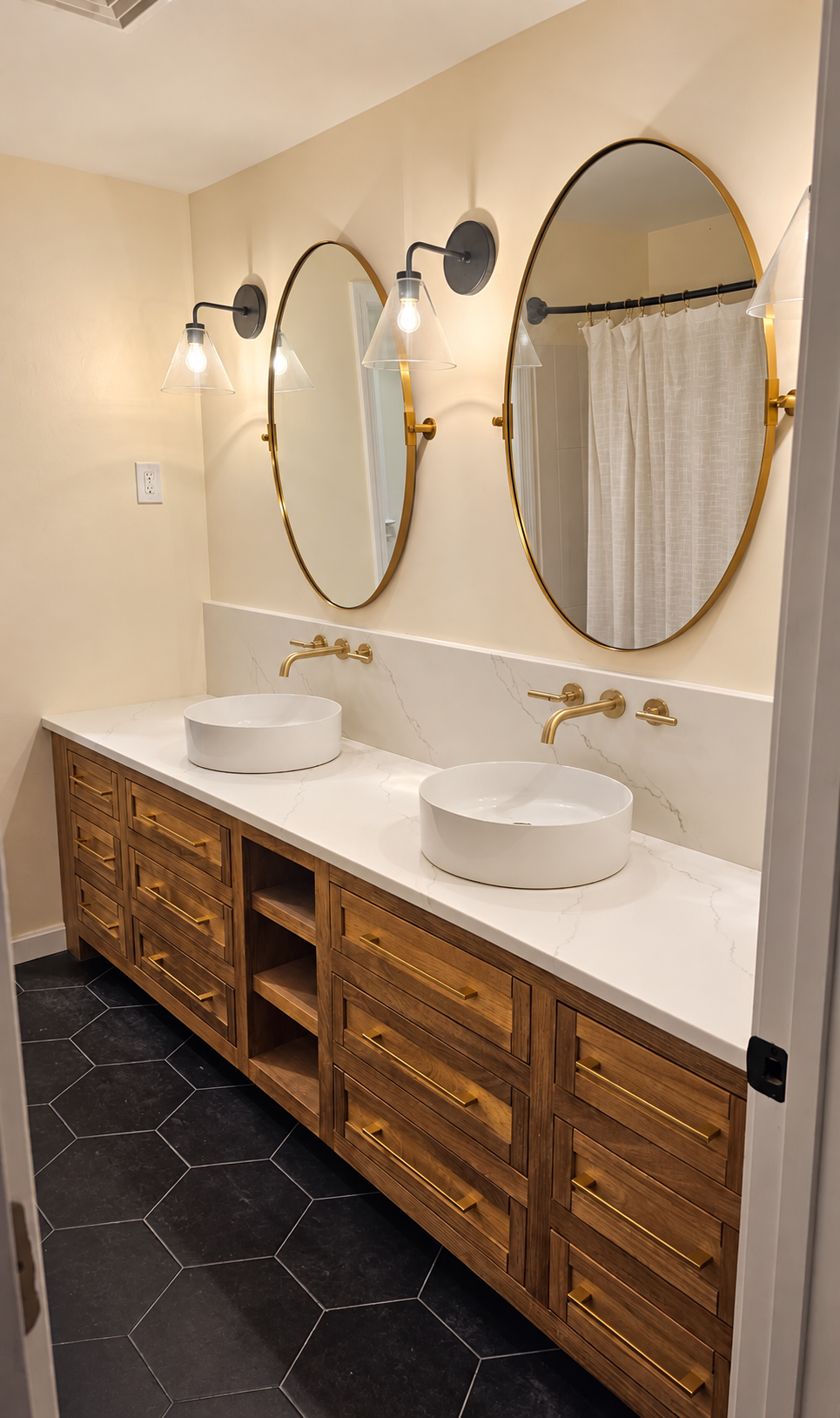 Custom built wood double vanity made from scratch with open shelves and two vessel sinks