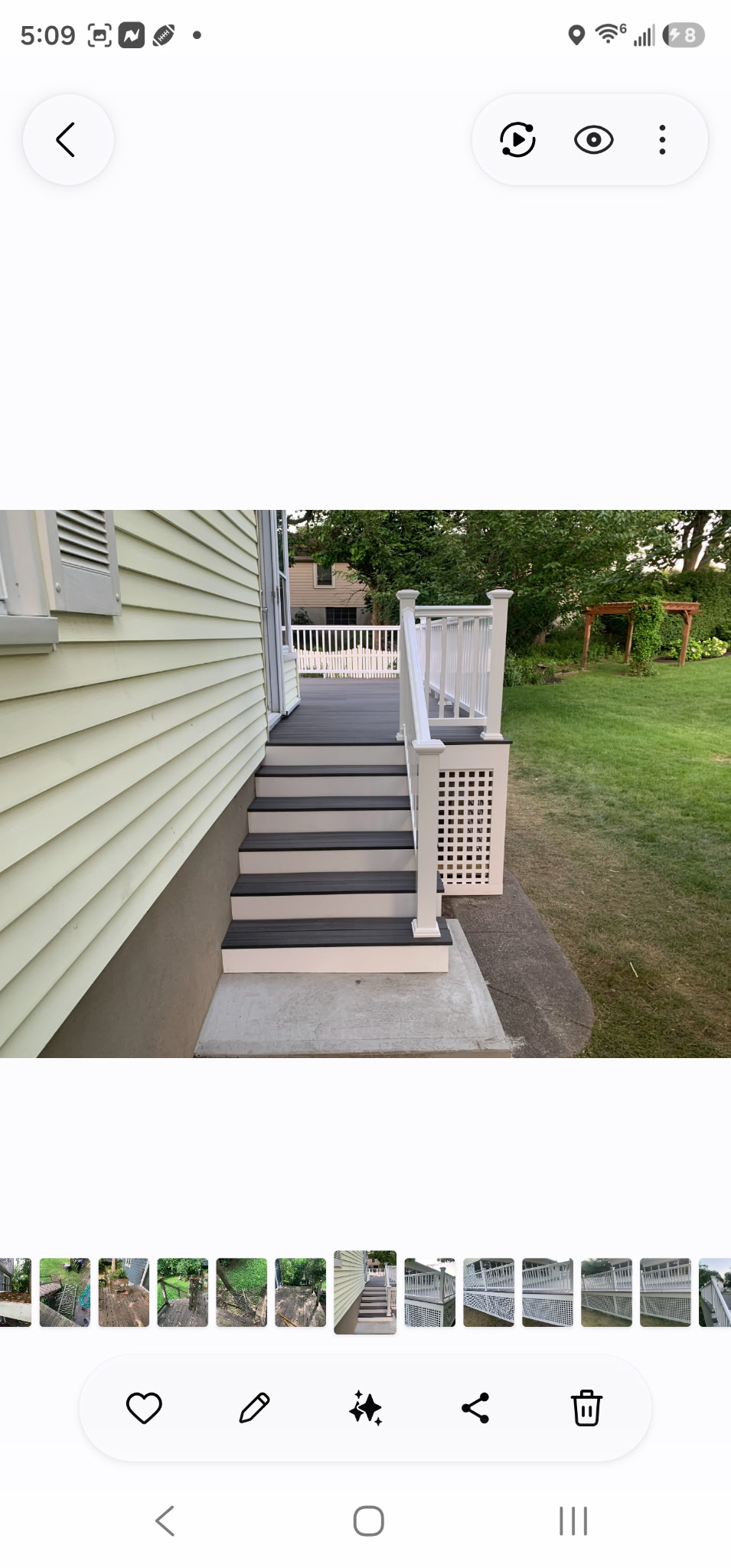 Deck stairs and white railing